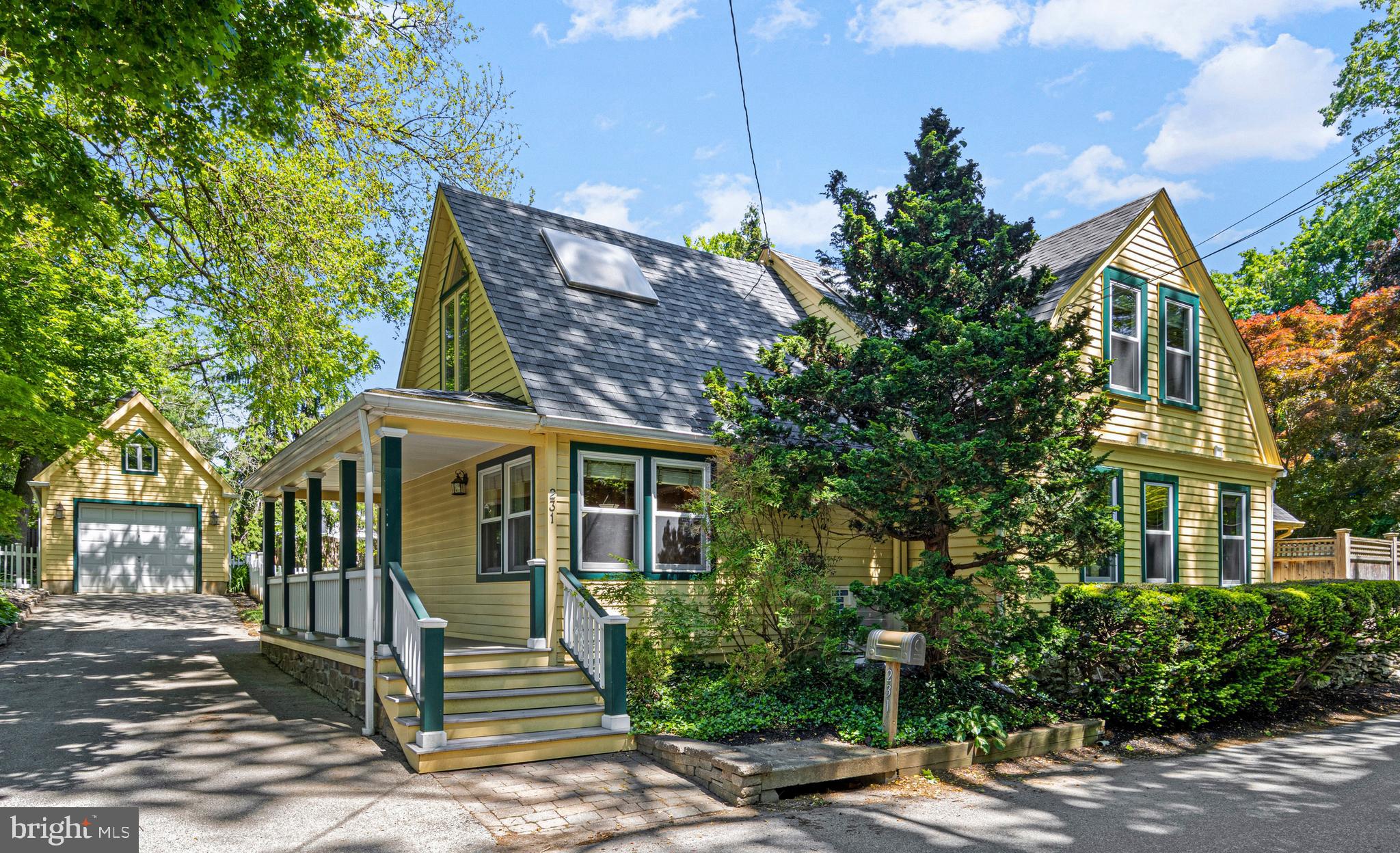 231 West Valley Road Wayne, PA 19087 - Photo 2 of 61 a front view of a house with a tree