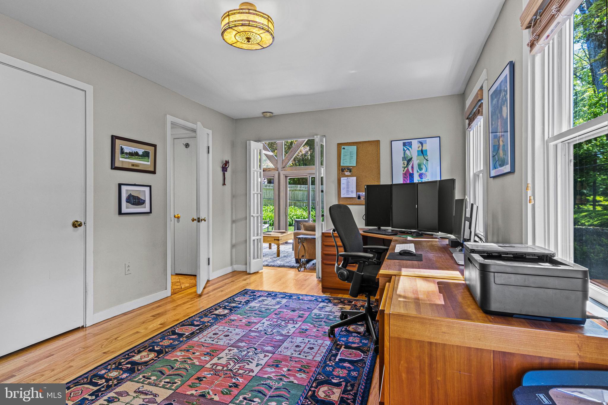 231 West Valley Road Wayne, PA 19087 - Photo 24 of 61 a view of a livingroom with workspace and a window