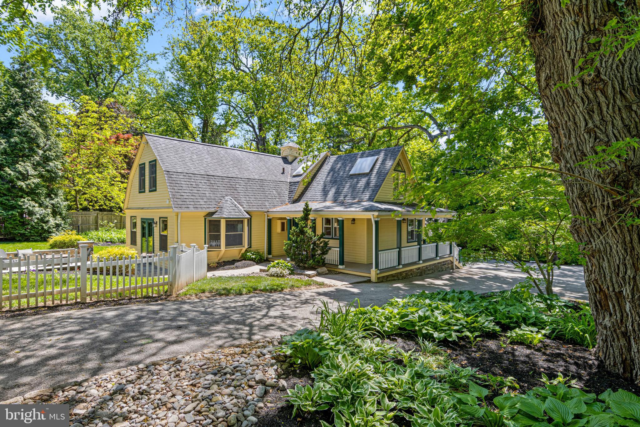 231 West Valley Road Wayne, PA 19087 - Photo 4 of 61 a view of a house with a big yard plants and large trees