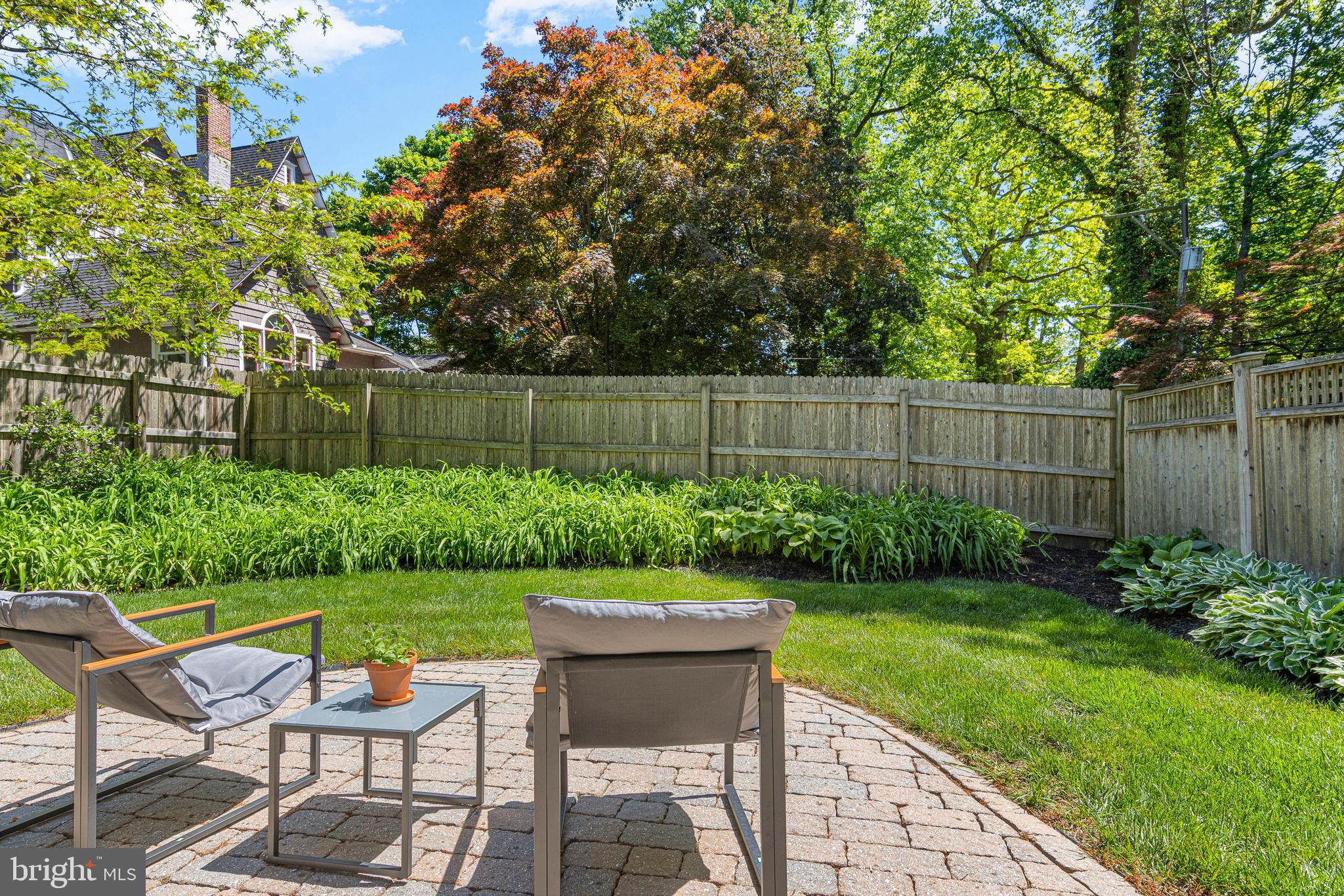 231 West Valley Road Wayne, PA 19087 - Photo 43 of 61 a view of a chair and table in the garden and sitting area
