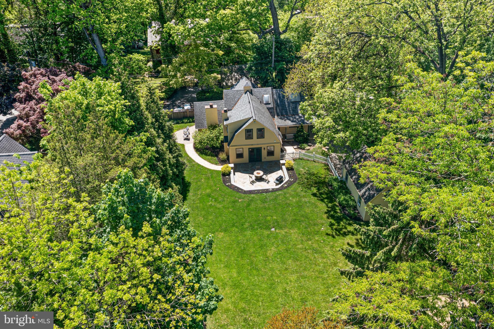 231 West Valley Road Wayne, PA 19087 - Photo 59 of 61 a front view of a house with a yard and fountain
