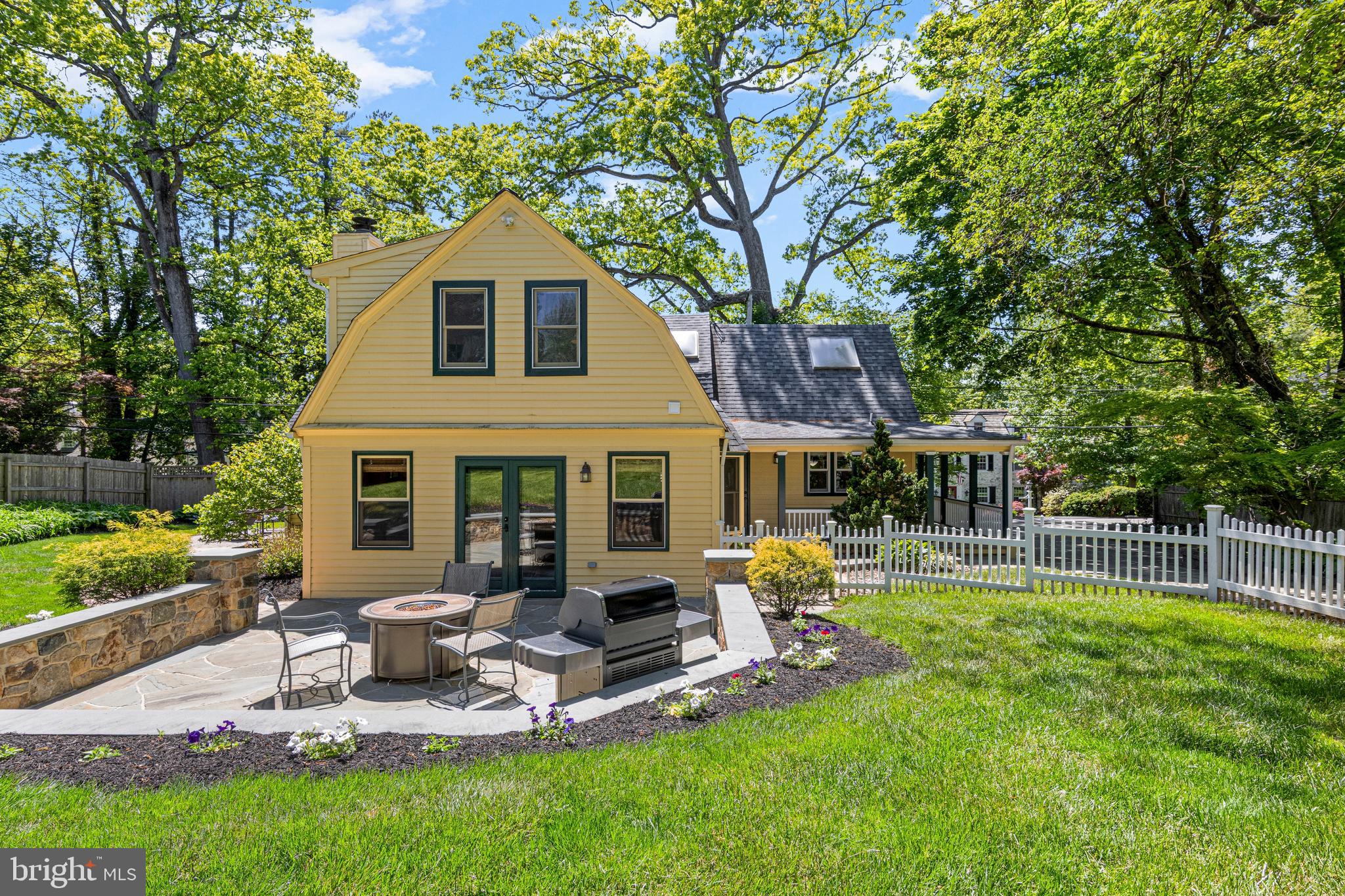 231 West Valley Road Wayne, PA 19087 - Photo 6 of 61 a front view of house with a garden and patio