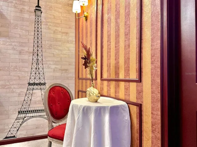 a bathroom with a granite countertop bathtub and sink