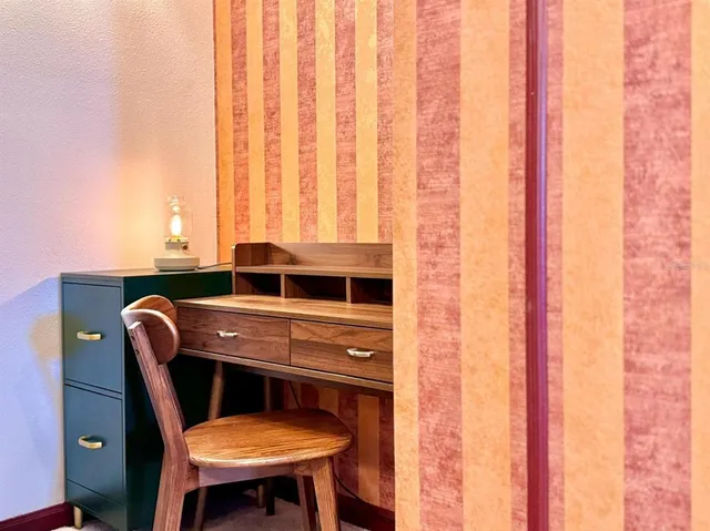 a view of balcony with furniture