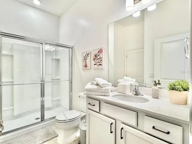 a outdoor living space with furniture and a potted plant