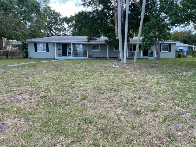 709 Indian Rocks Road Belleair, FL 33756 - Photo 16 of 19 front view of a house with a yard