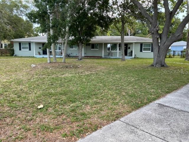 709 Indian Rocks Road Belleair, FL 33756 - Photo 17 of 19 a view of a house with a garden