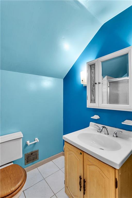 217 Center Church Road Canonsburg, PA 15317 - Photo 16 of 26 a bathroom with a sink a toilet and mirror