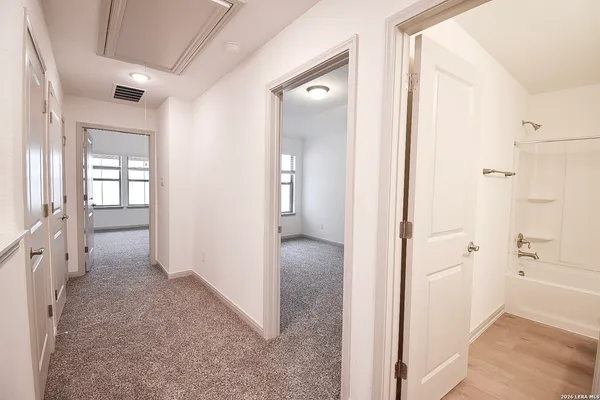 an empty room with windows