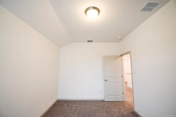 a storage room with washer and dryer