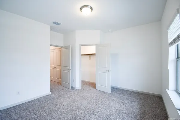 a view of a room with an empty space