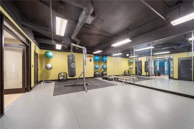 a view of a room with gym equipment