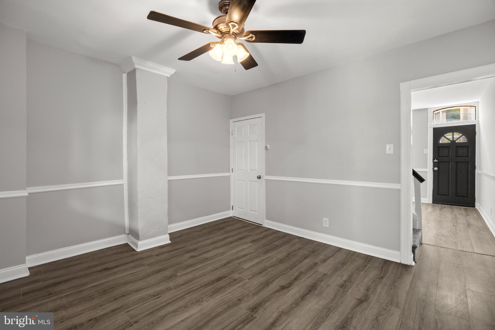 348 Carson Street Philadelphia, PA 19128 - Photo 5 of 27 a view of an empty room with wooden floor