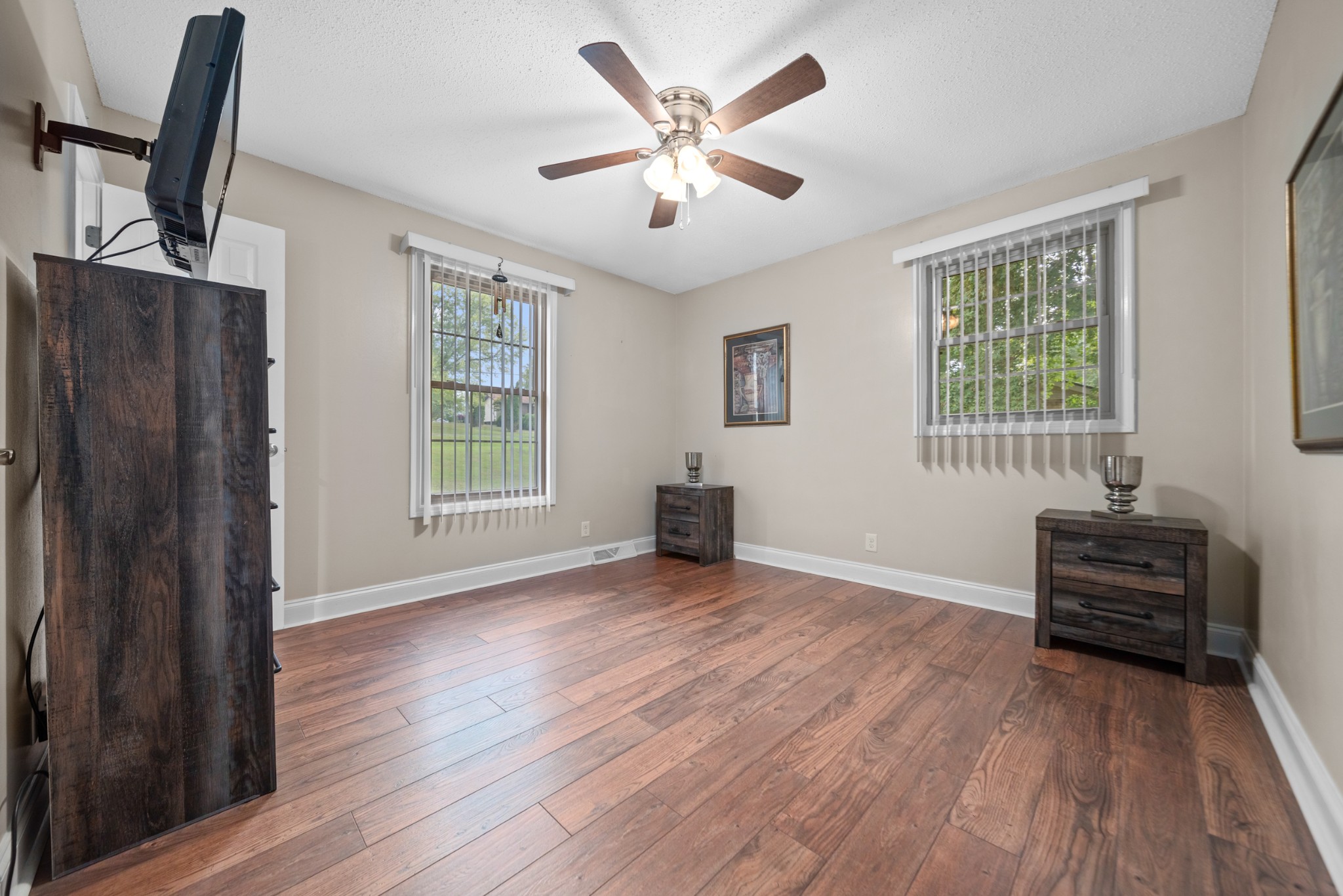 739 Pollard Road Clarksville, TN 37042 - Photo 15 of 41 wooden floor in an empty room with a window