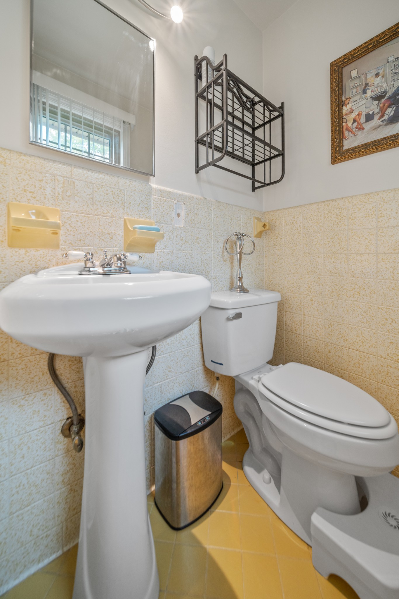 739 Pollard Road Clarksville, TN 37042 - Photo 17 of 41 a bathroom with a sink a toilet and a mirror