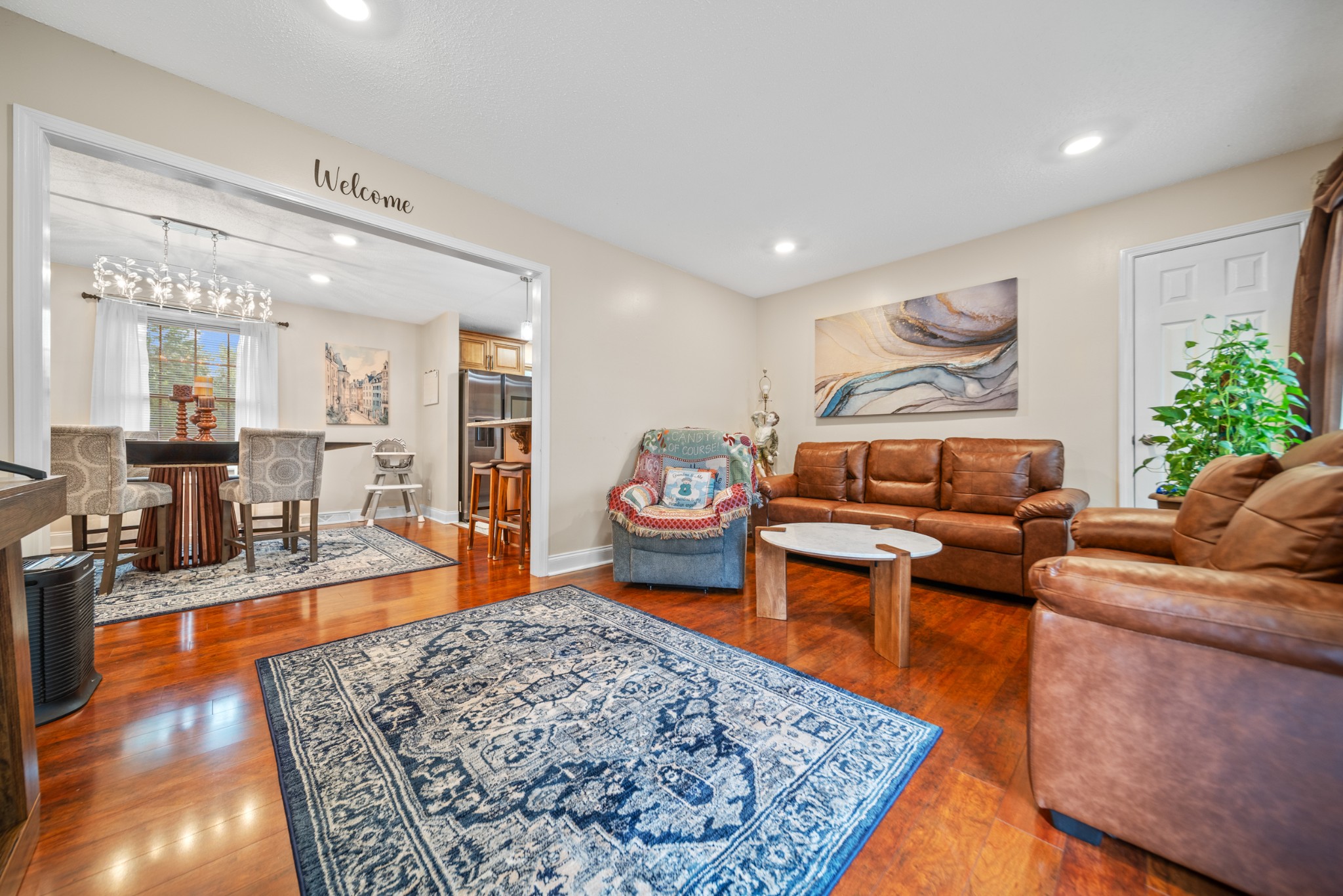 739 Pollard Road Clarksville, TN 37042 - Photo 2 of 41 a living room with furniture and a wooden floor