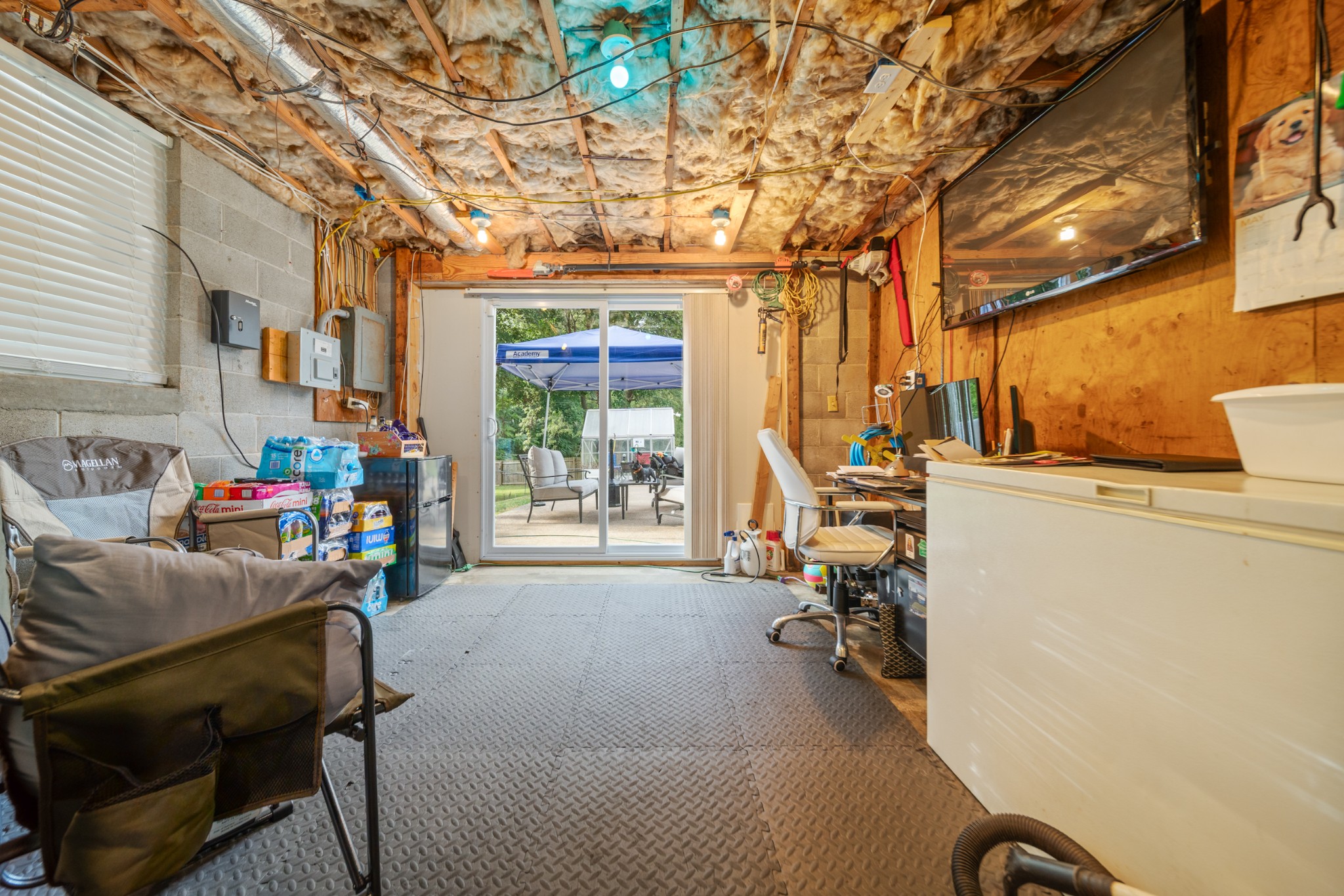 739 Pollard Road Clarksville, TN 37042 - Photo 27 of 41 a view of a livingroom with furniture and a patio