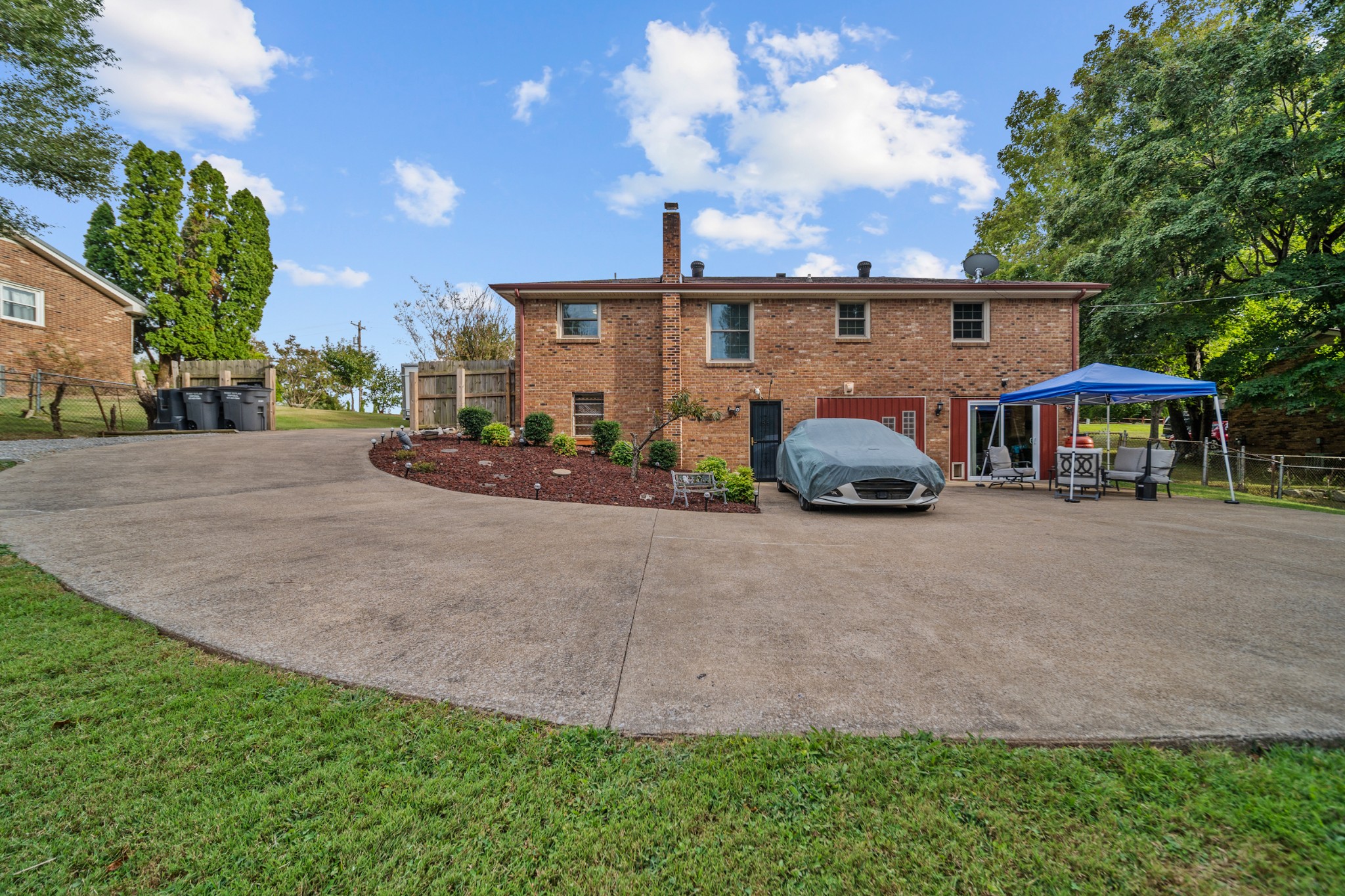 739 Pollard Road Clarksville, TN 37042 - Photo 31 of 41 a front view of a house with a yard and garage