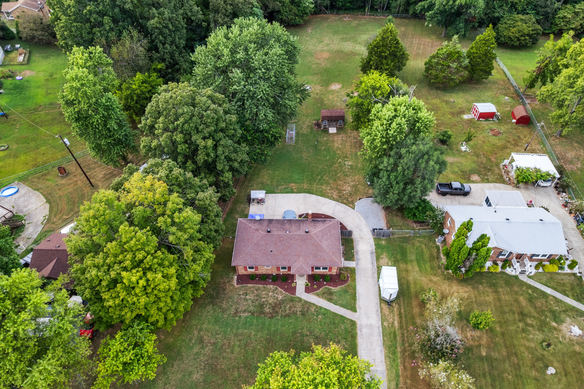 739 Pollard Road Clarksville, TN 37042 - Photo 37 of 41 an aerial view of a house with a garden and lake view