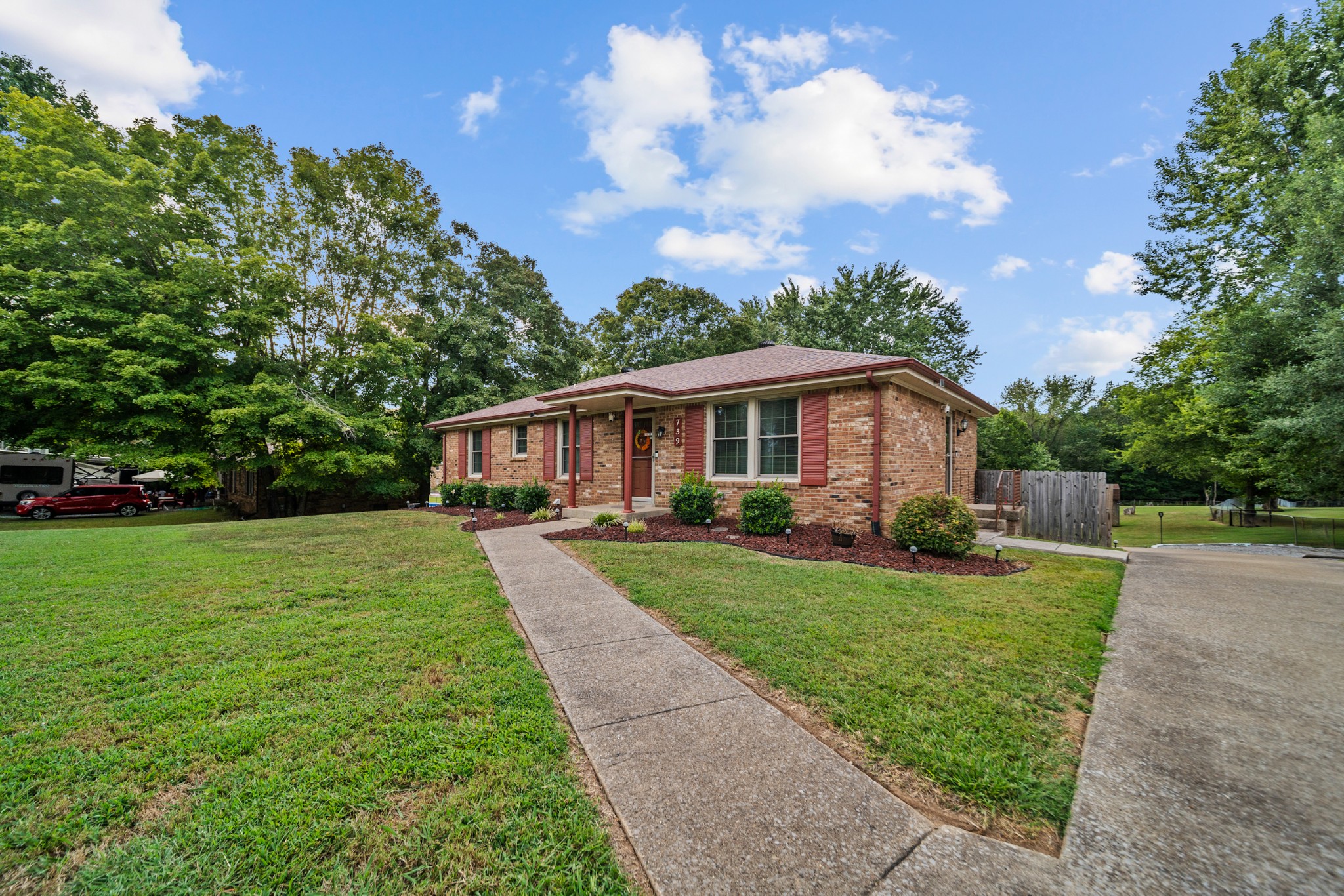 739 Pollard Road Clarksville, TN 37042 - Photo 39 of 41 a front view of a house with garden