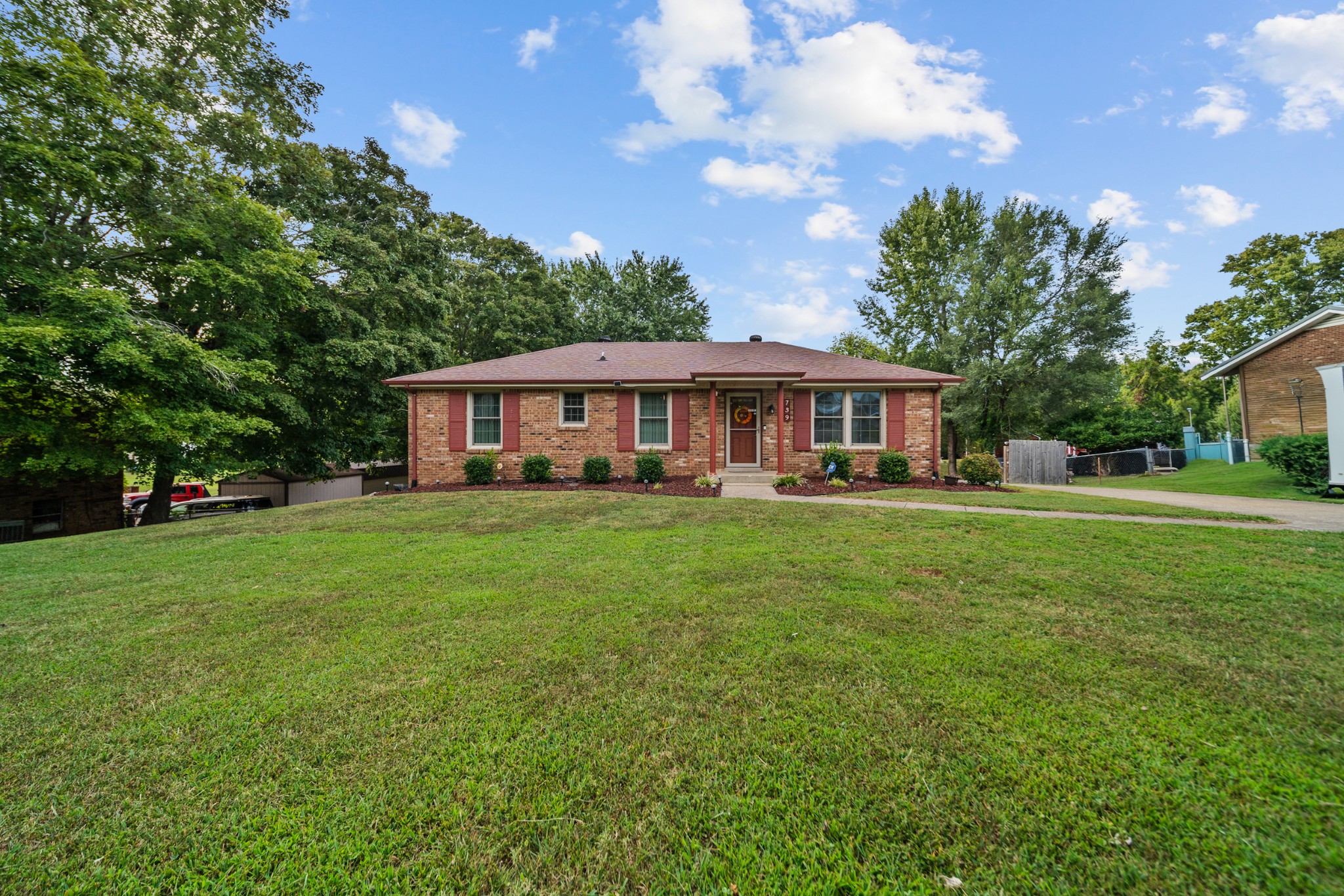739 Pollard Road Clarksville, TN 37042 - Photo 41 of 41 a front view of a house with garden