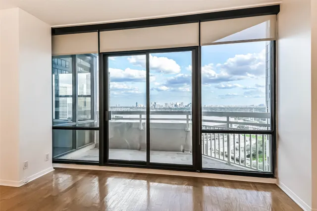 a view of a room with a large window