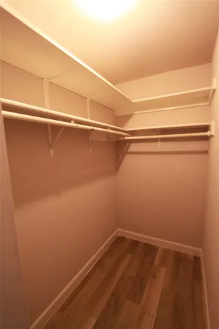 a view of a room with racks on the wall