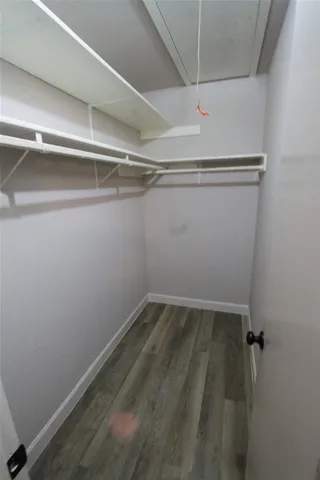 a view of a room with racks on the wall