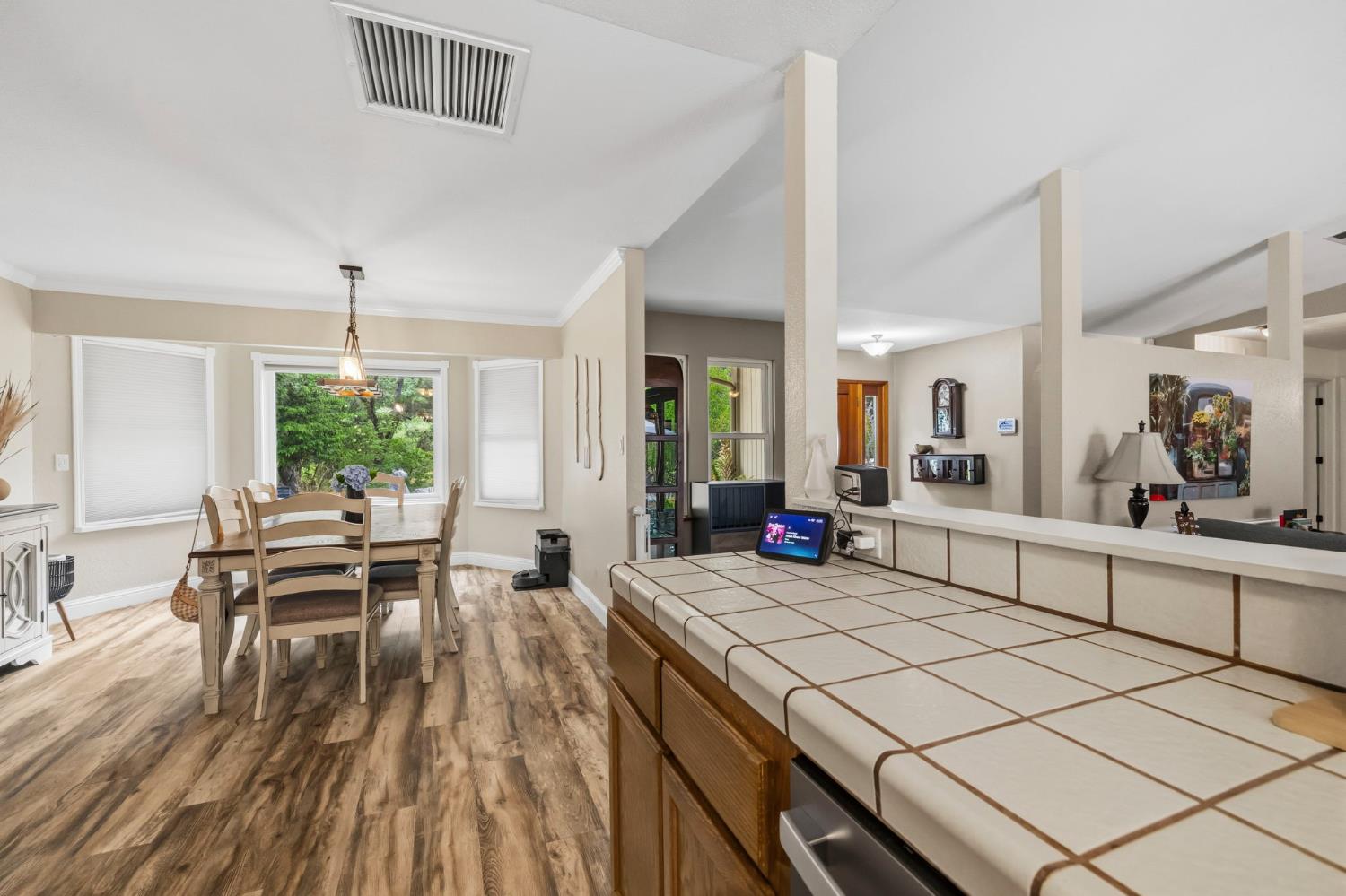 11460 Racetrack Road Sonora, CA 95370 - Photo 14 of 46 a kitchen with a sink and living room view
