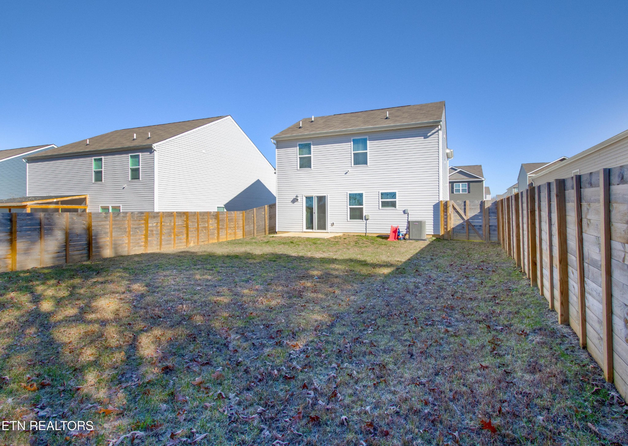 7535 Grasshopper Lane Corryton, TN 37721 - Photo 21 of 28 a view of a house with backyard and trees