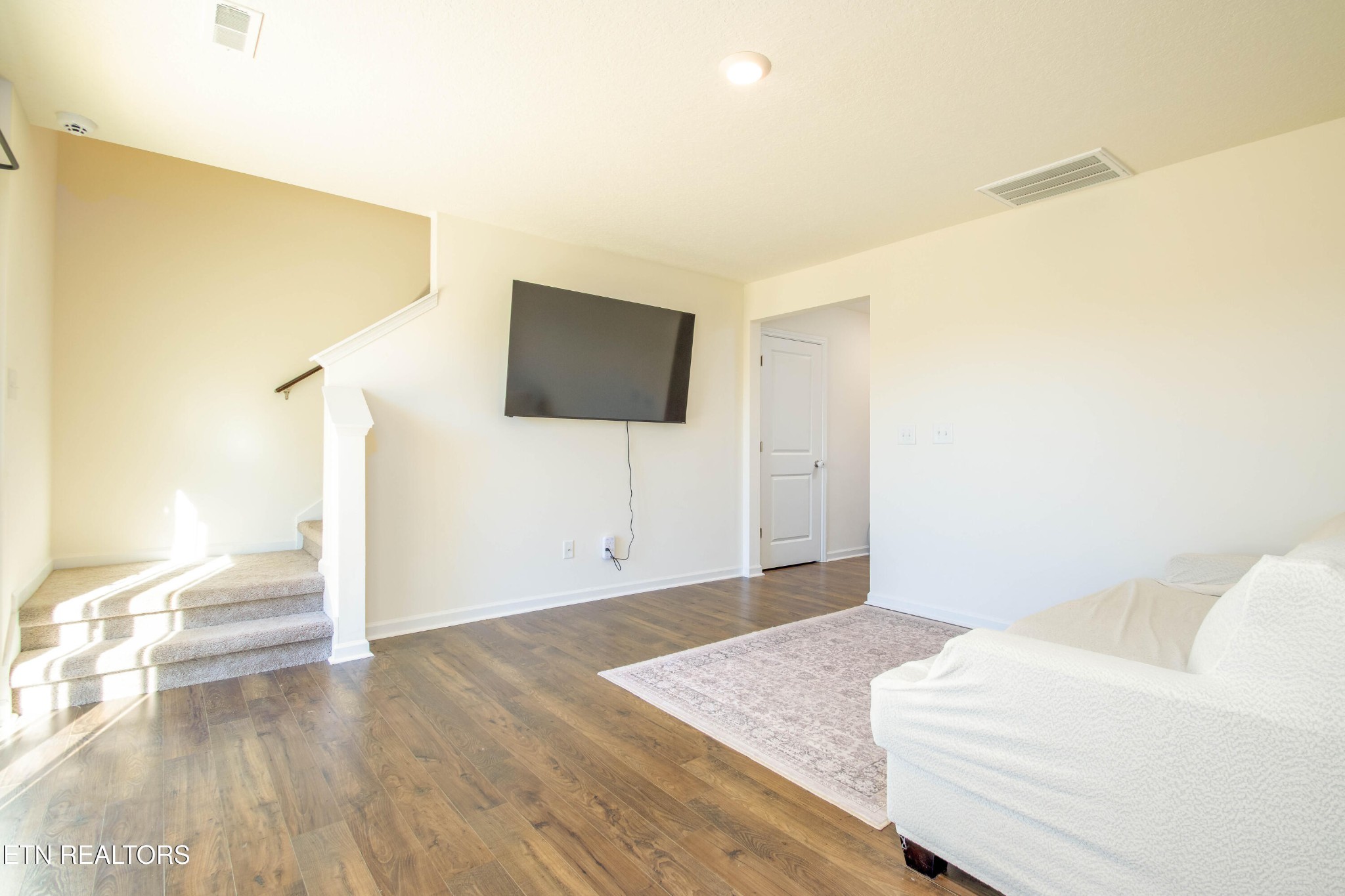 7535 Grasshopper Lane Corryton, TN 37721 - Photo 5 of 28 a bedroom with a bed and a flat screen tv