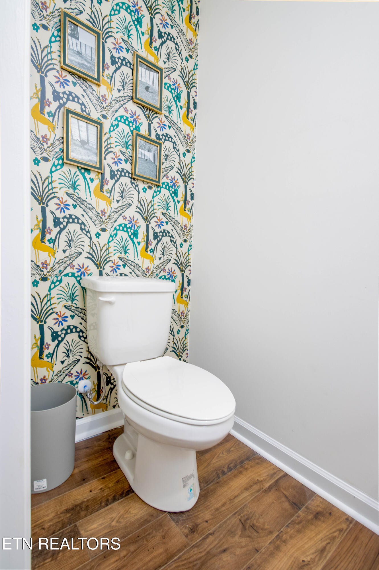 7535 Grasshopper Lane Corryton, TN 37721 - Photo 7 of 28 a white toilet sitting next to a shower curtain