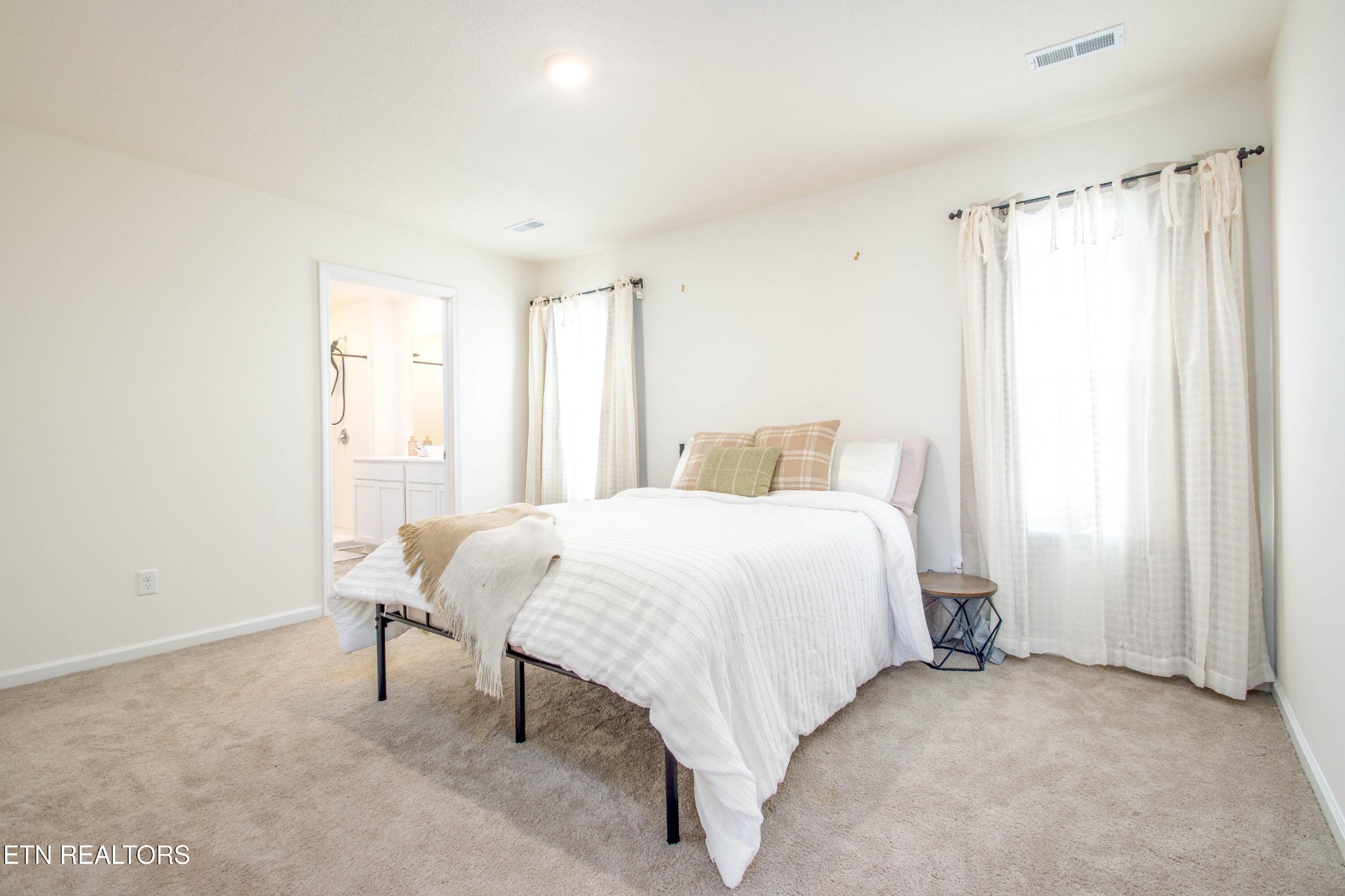 7535 Grasshopper Lane Corryton, TN 37721 - Photo 10 of 28 a bedroom with a bed and a window