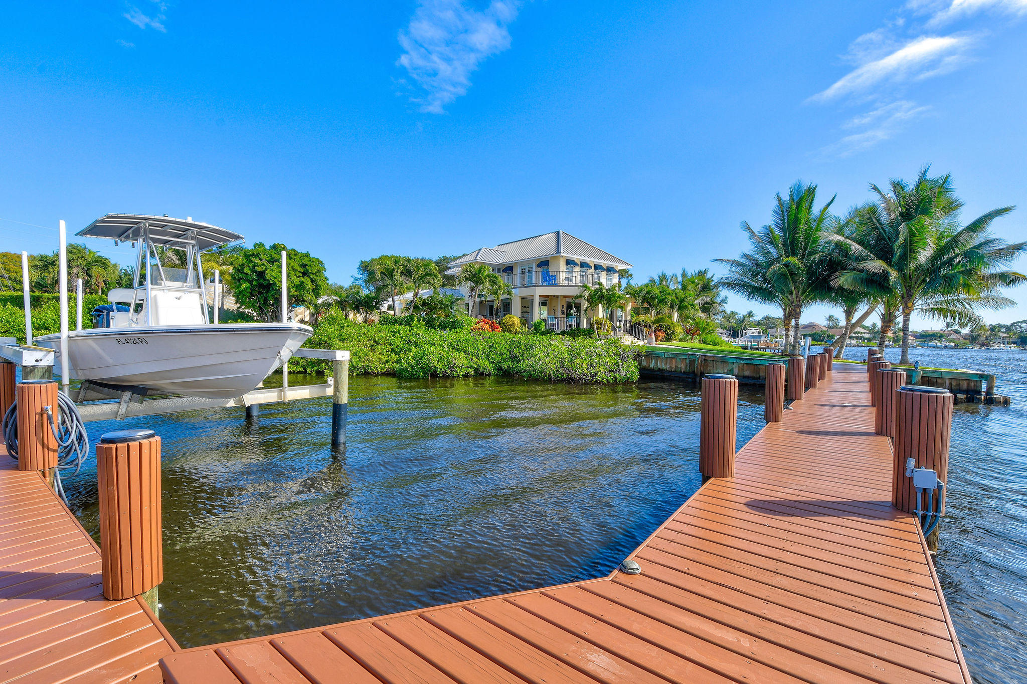 4980 County Line Road Tequesta, FL 33469 - Photo 38 of 56 New dock with 2 boat lifts