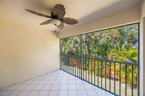 a view of a balcony with a chandelier