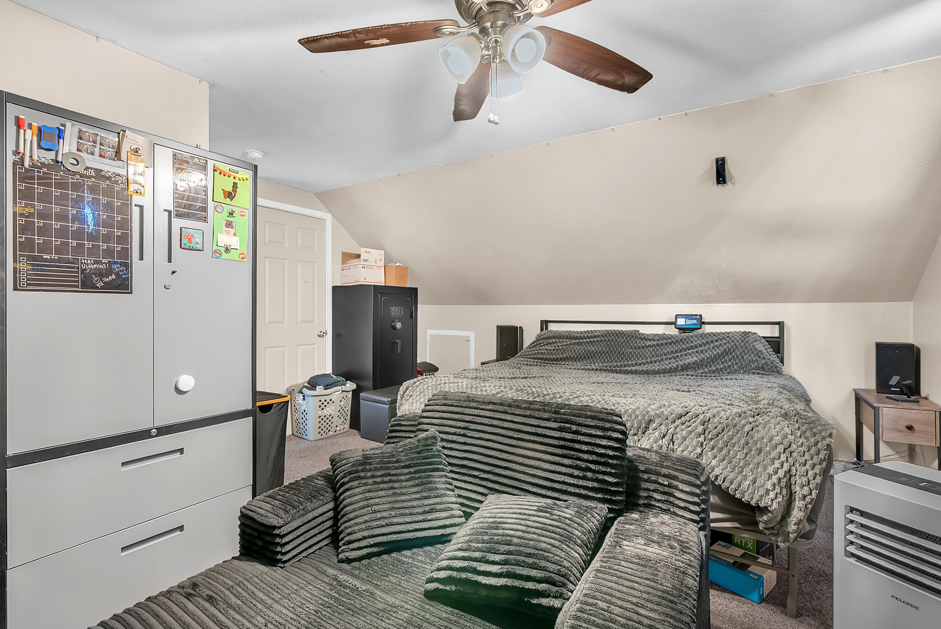 719 Capitol Road Valparaiso, IN 46385 - Photo 12 of 37 a bedroom with a bed and wooden floor