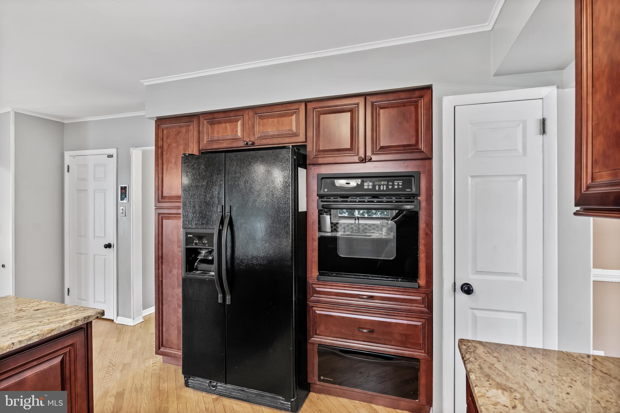 803 Charleston Road Mount Laurel, NJ 08054 - Photo 13 of 36 a kitchen with stainless steel appliances granite countertop a refrigerator and a stove