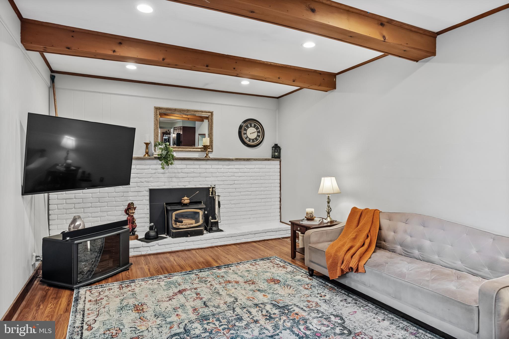 803 Charleston Road Mount Laurel, NJ 08054 - Photo 16 of 36 a living room with furniture and a flat screen tv