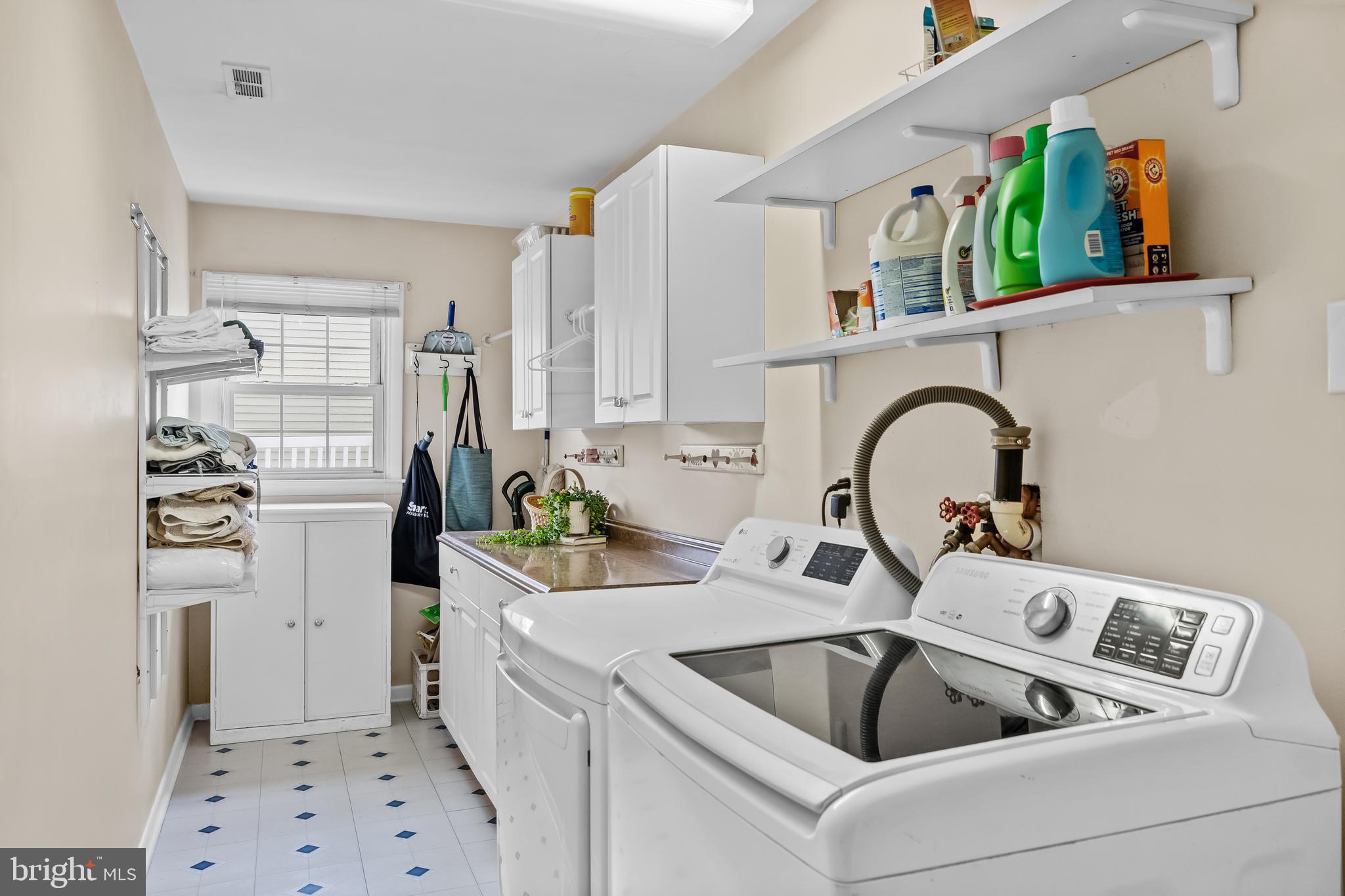 803 Charleston Road Mount Laurel, NJ 08054 - Photo 19 of 36 a kitchen with a refrigerator sink and white cabinets