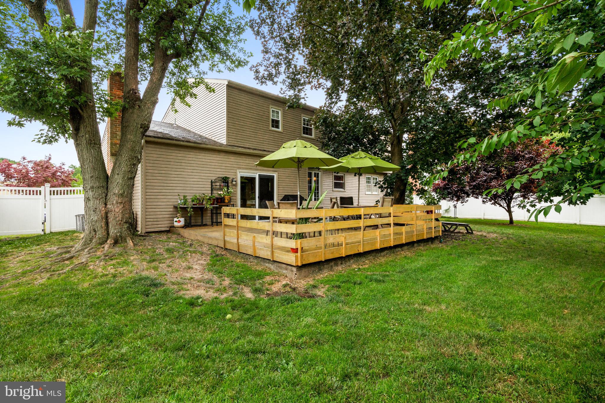 803 Charleston Road Mount Laurel, NJ 08054 - Photo 33 of 36 a white house that has a tree in front of a house