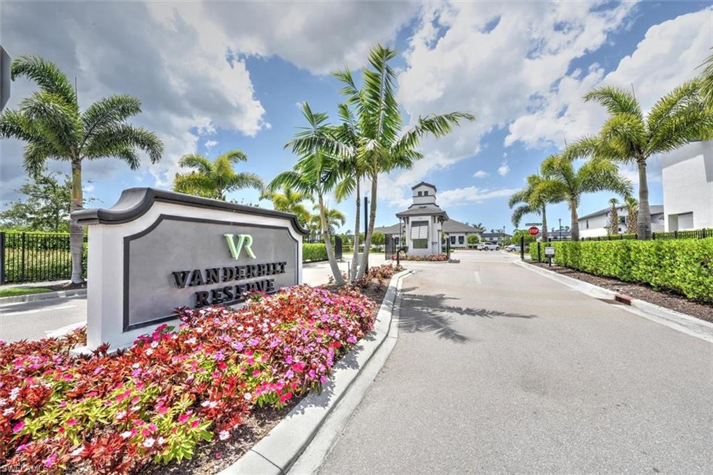 7546 Rockefeller Drive Naples, FL 34119 - Photo 2 of 31 View of community / neighborhood sign