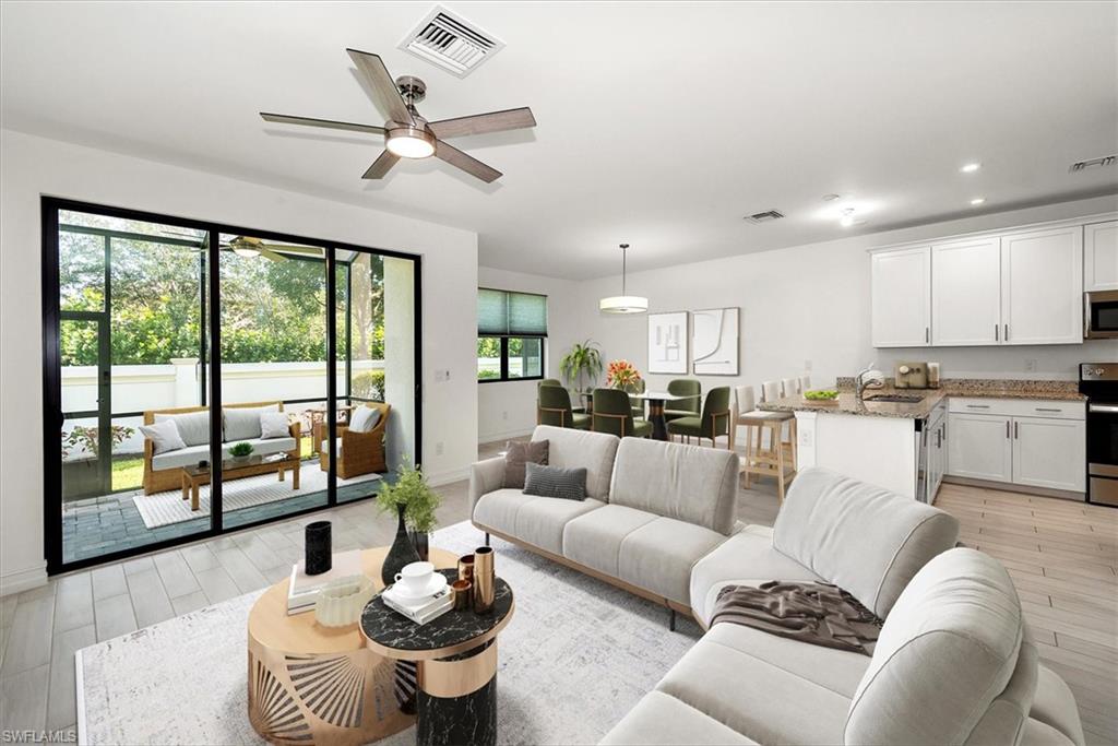 7546 Rockefeller Drive Naples, FL 34119 - Photo 4 of 31 Living area with wood tiled floors, recessed lighting, and a ceiling fan