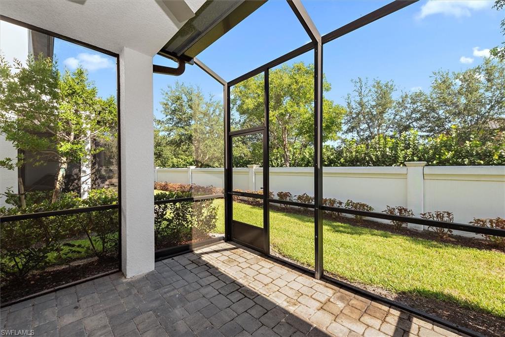 7546 Rockefeller Drive Naples, FL 34119 - Photo 6 of 31 View of unfurnished sunroom