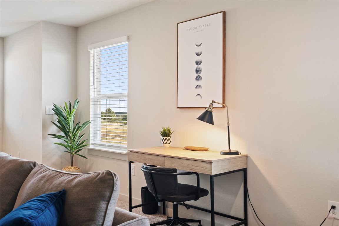 8313 City Top Boulevard Austin, TX 78724 - Photo 22 of 37 a view of a livingroom with furniture and window