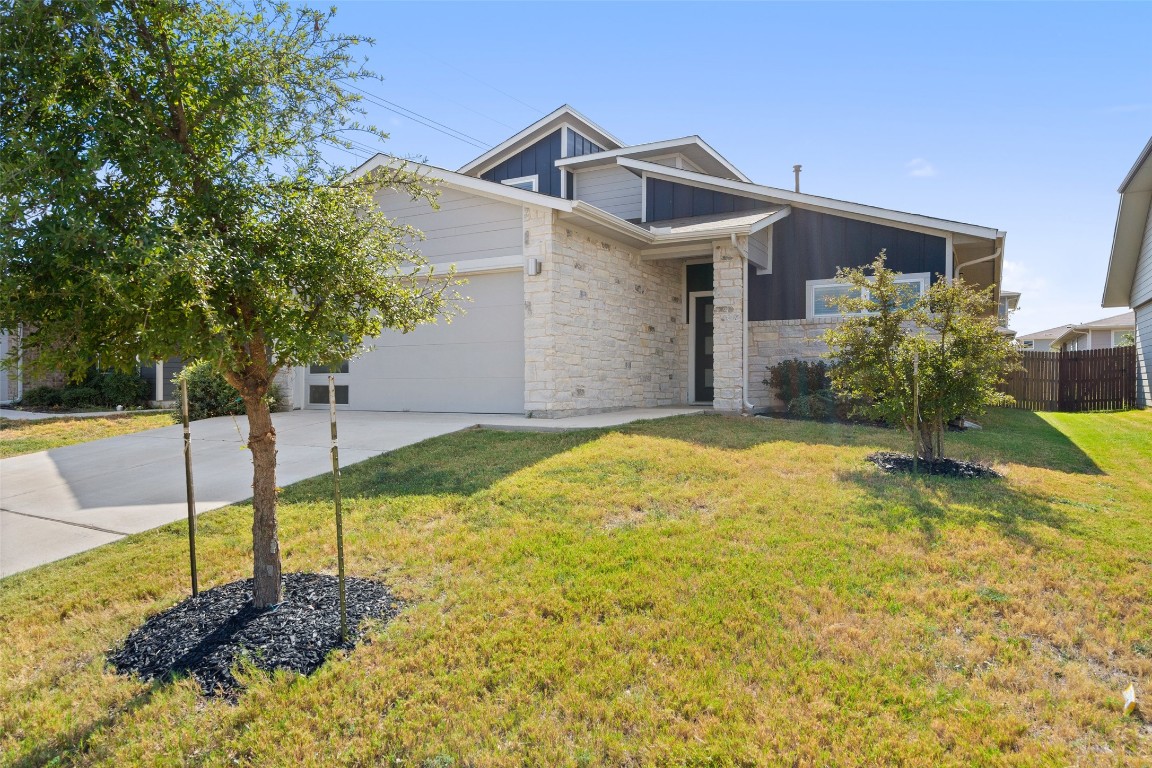 8313 City Top Boulevard Austin, TX 78724 - Photo 3 of 37 a swimming pool with some plants and large trees
