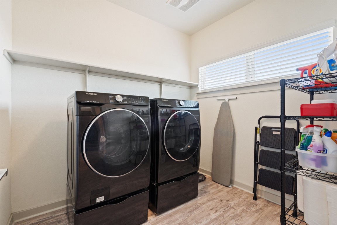 8313 City Top Boulevard Austin, TX 78724 - Photo 33 of 37 a utility room with dryer and washer