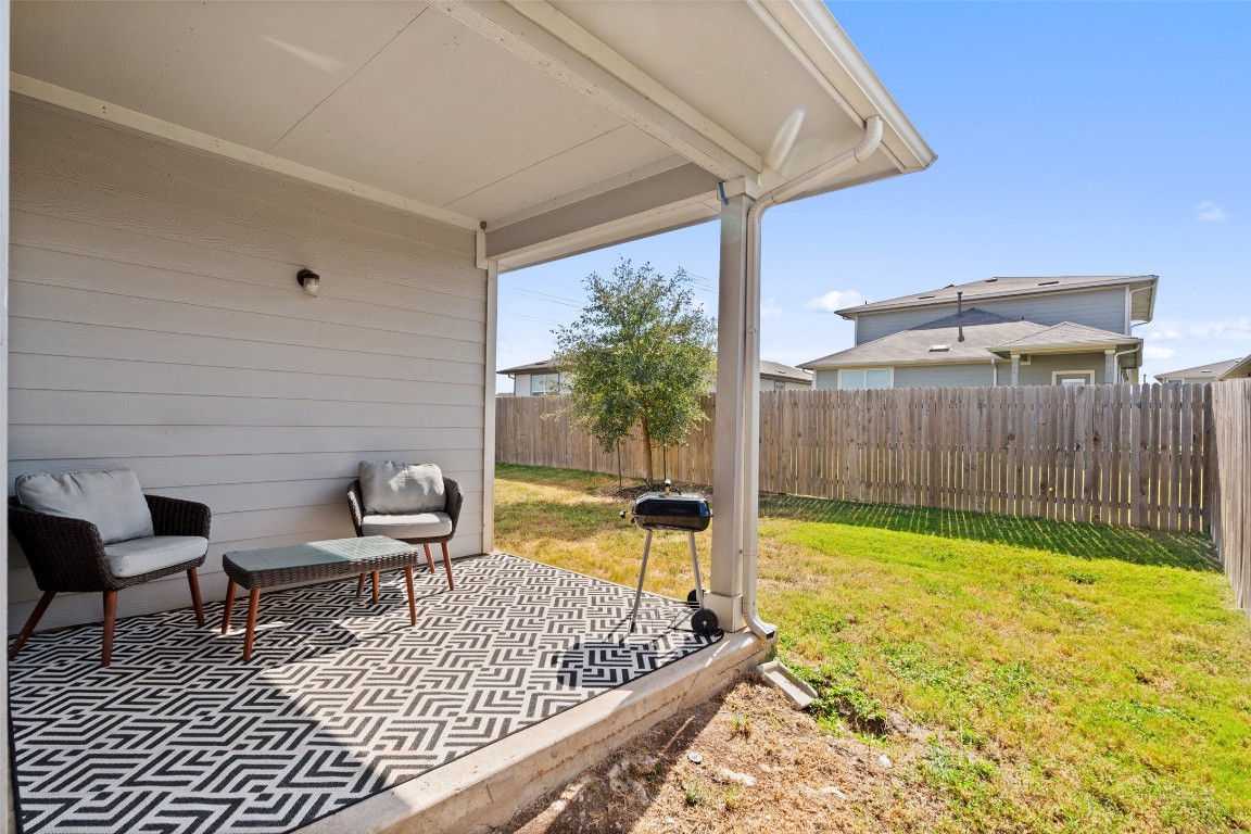 8313 City Top Boulevard Austin, TX 78724 - Photo 34 of 37 a view of a swimming pool with a lounge chair