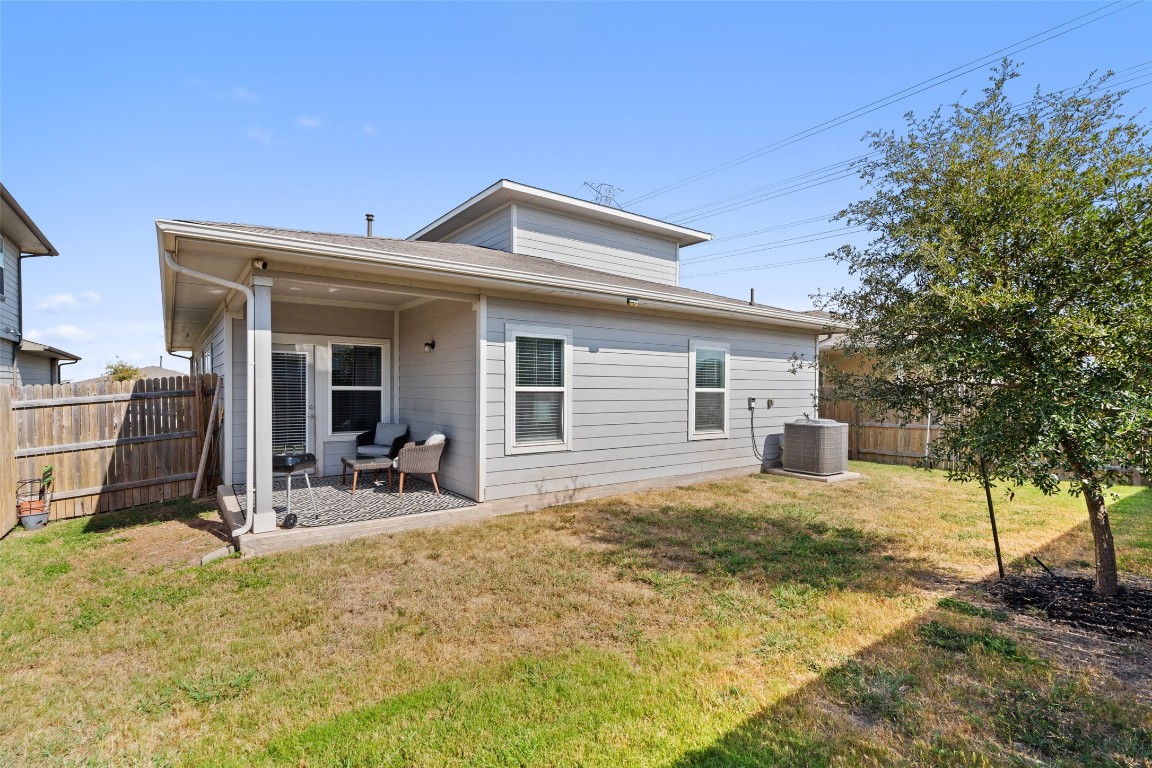 8313 City Top Boulevard Austin, TX 78724 - Photo 35 of 37 a view of a house with backyard and sitting area