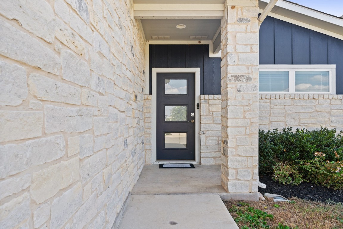 8313 City Top Boulevard Austin, TX 78724 - Photo 4 of 37 a view of an entrance of the house