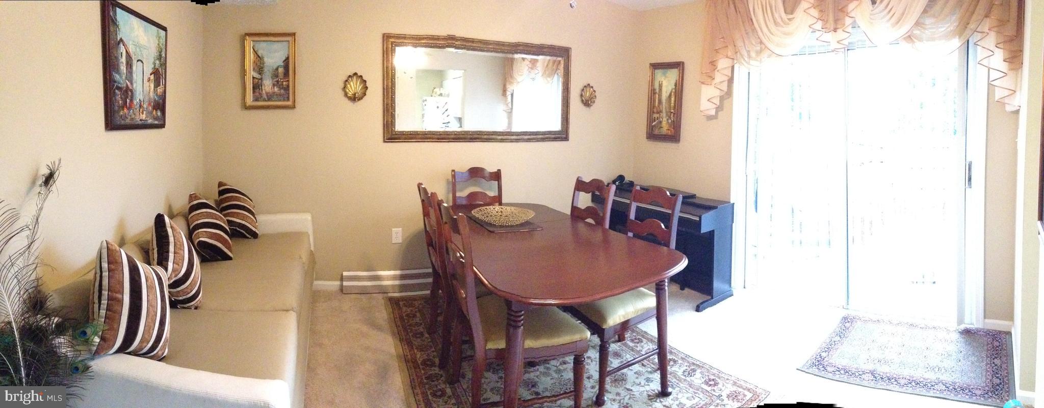 8970 Miles Place Manassas, VA 20110 - Photo 5 of 12 a bathroom with a sink and a mirror